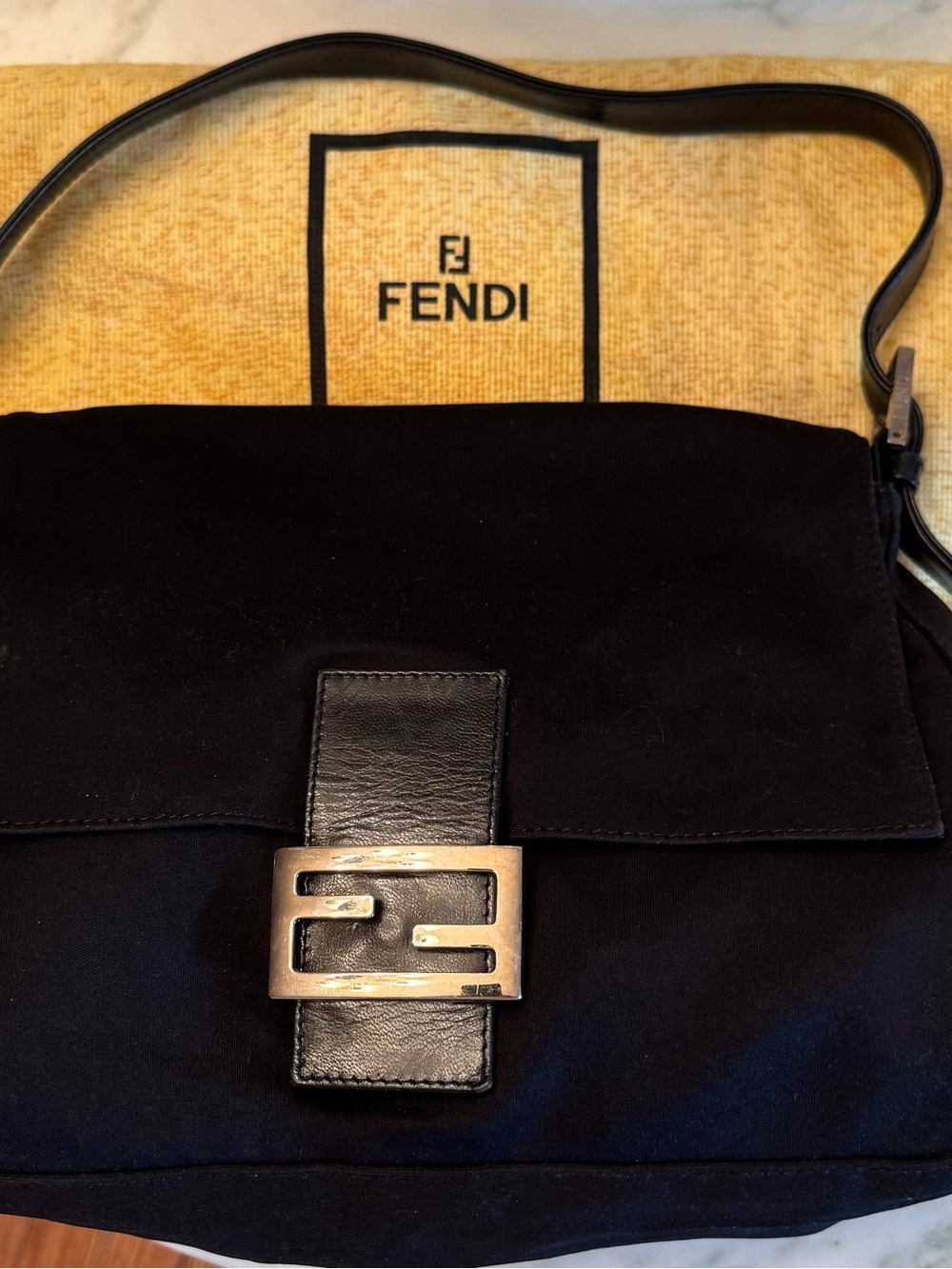 Fendi Mamma Baguette Black Fabric Vintage Shoulder Bag with FF Buckle.